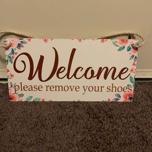 Hanging sign for door